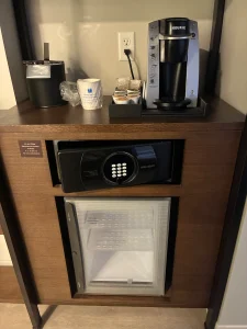 Keurig coffee machine and beverage cooler in a room at Hyatt Regency Portland 