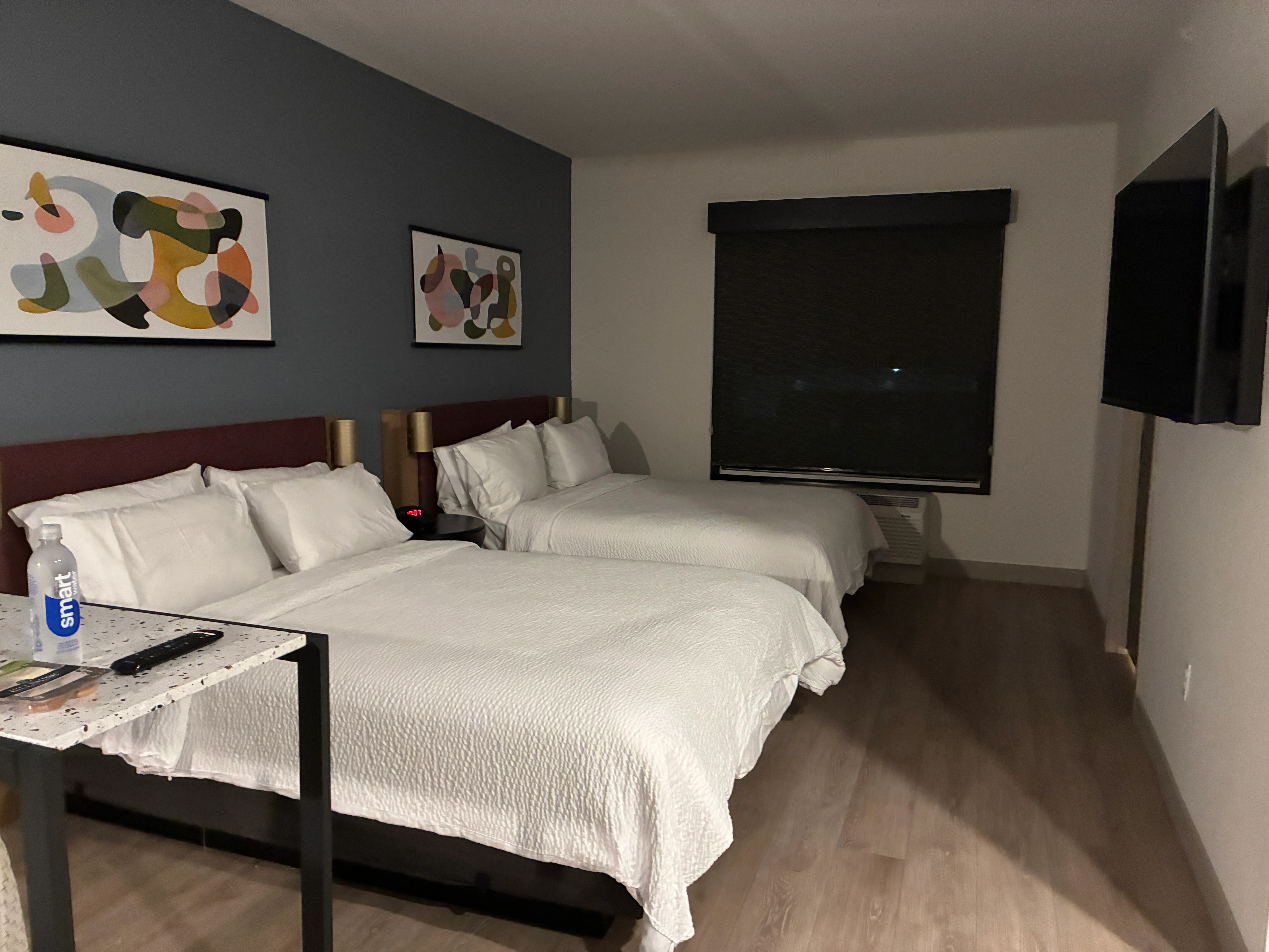 queen beds in a suite at Atwell Suites in Kansas City