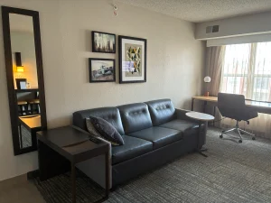sofa and chairs in living area of a suite in the Residence Inn Indianapolis Downtown on the Canal