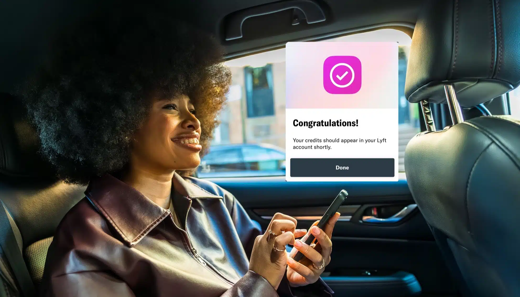 you woman in a Lyft car
