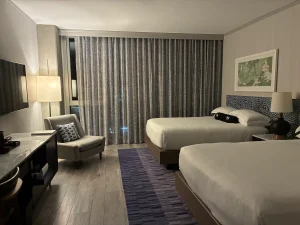 two queen beds in a room at the Kimpton Rowan Palm Springs Hotel